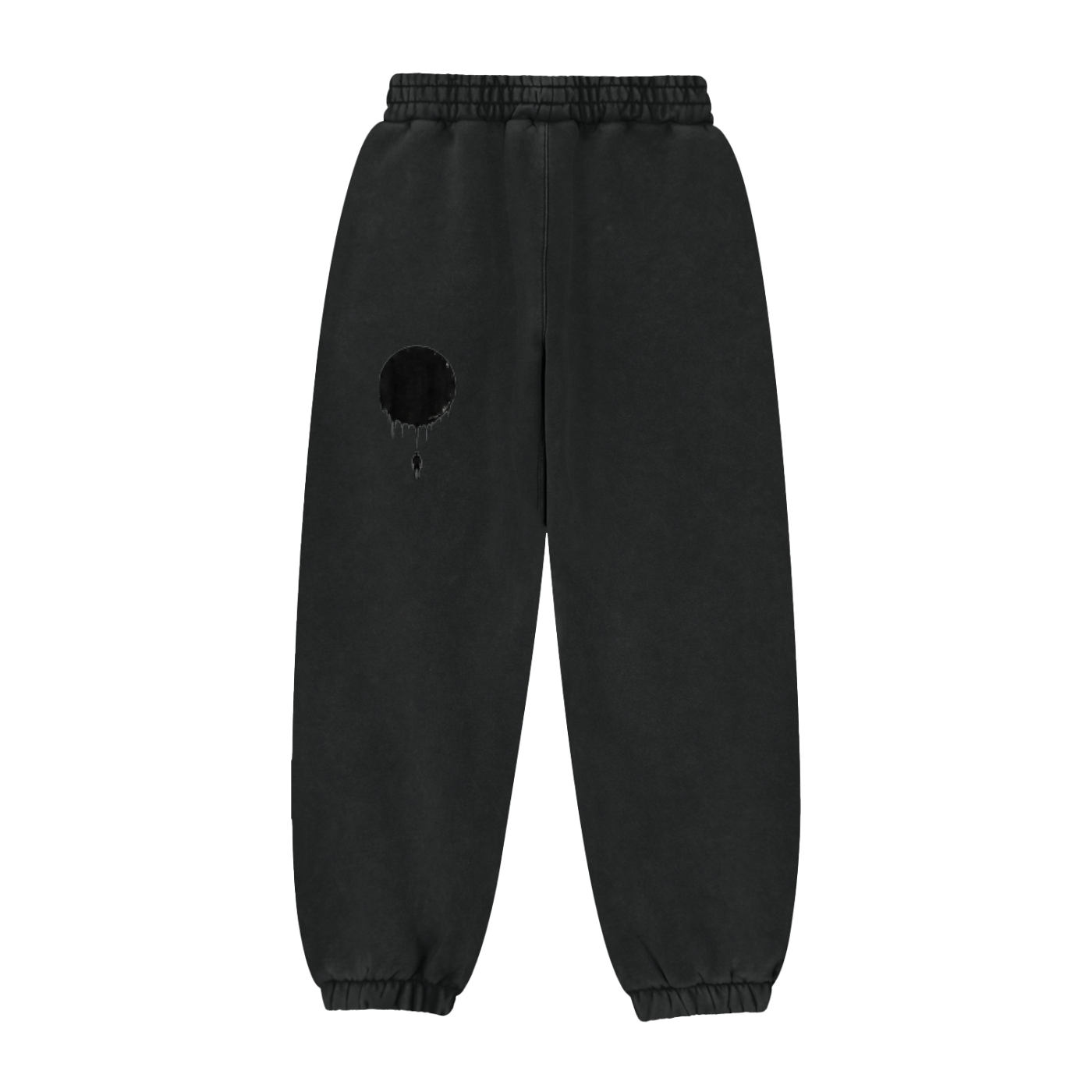 Black sweatpants with elastic waistband and cuffs, dark eclipse patch on leg with small drips