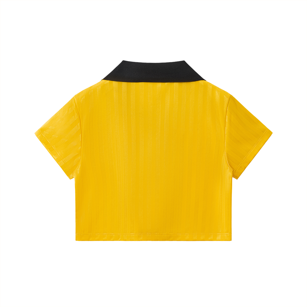 Back view of cropped jersey top in bright yellow with black contrast collar.