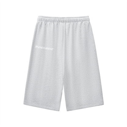 Light gray three-quarter sweatpants with elastic waistband and drawstring, small left logo
