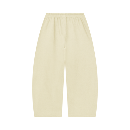 Unisex barrel-leg pants in oat-cream with elastic waistband, back view