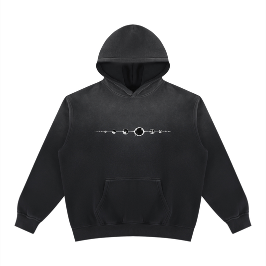 Black fleece hoodie with hood, pouch pocket, and front silver ring graphic