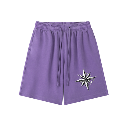 Purple vintage-wash cotton shorts with elastic waistband, drawstring, and star graphic