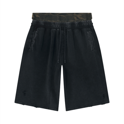 Black wide-leg distressed shorts with elastic camo waistband and drawstring, side ties