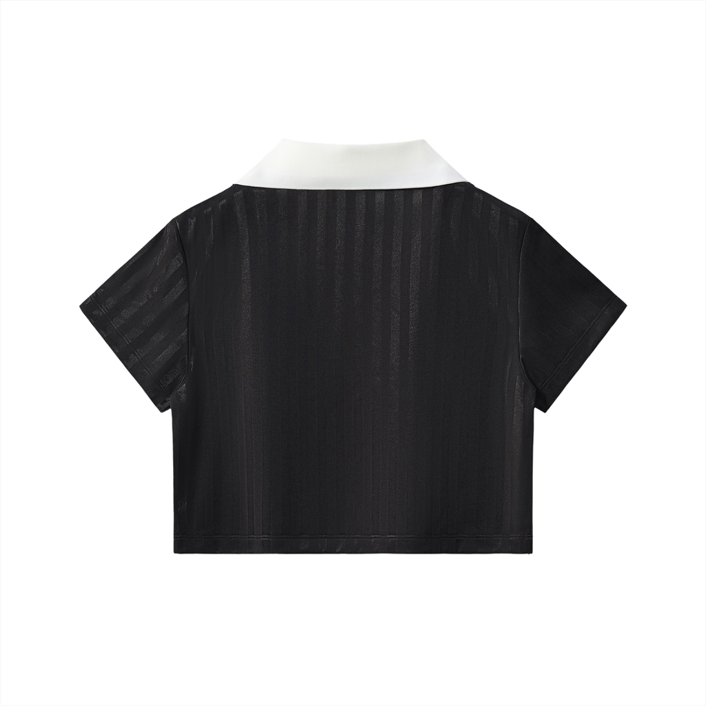 Back view of cropped jersey top with dark fabric and contrast light collar.