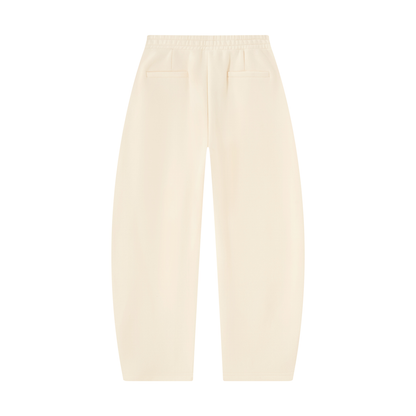 Ivory barrel-leg unisex sweatpants with side pockets and elastic waistband