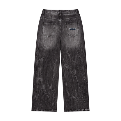 Black wide-leg jeans with vintage wash and front button and two patch pockets