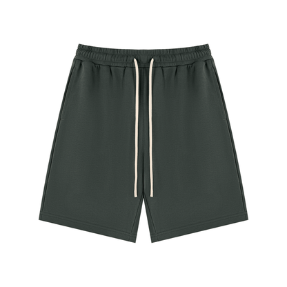 Dark green unisex drawstring shorts, front view with elastic waist and white drawcords