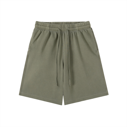 Cotton vintage-wash shorts in army green, elastic waist with drawstring, side slit pockets