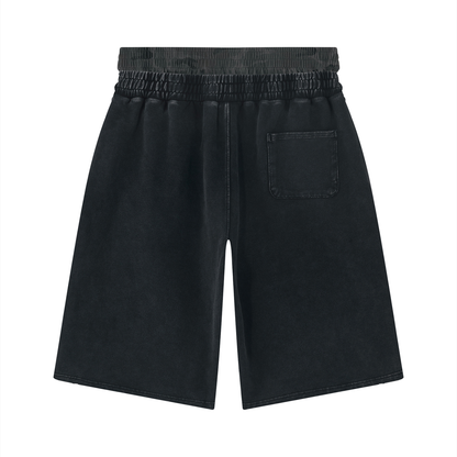 Wide-leg distressed shorts with elastic waistband, drawstring, and back patch pocket