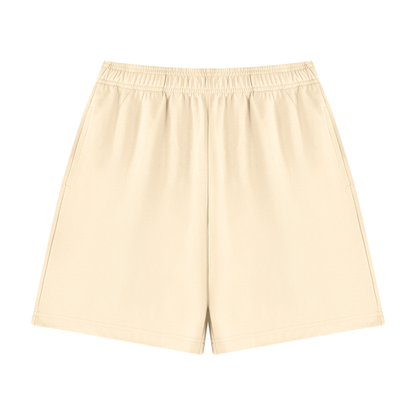 Unisex cotton shorts in light apricot, elastic waistband, no visible pocket.