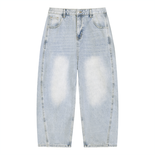 Light blue barrel-leg jeans with vintage sunfade wash, front button, and slash pockets