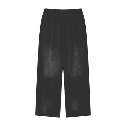 Black loose-fit cotton sweatpants with elastic waistband and side pockets