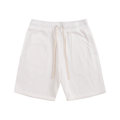 Cotton streetwear shorts, white with elastic waistband and drawstring, side pockets