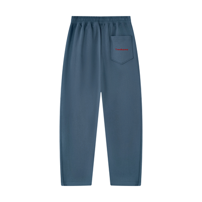Haze blue unisex tapered straight hem sweatpants, elastic waist, small logo label on front pocket