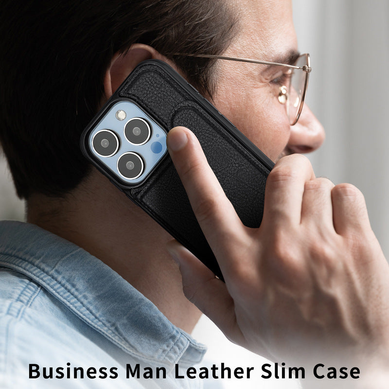 Black leather phone case with card pocket on a phone held near the face