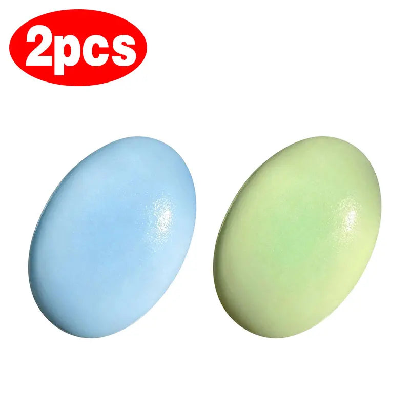 Set of two oval squishy stress toys in blue and light green