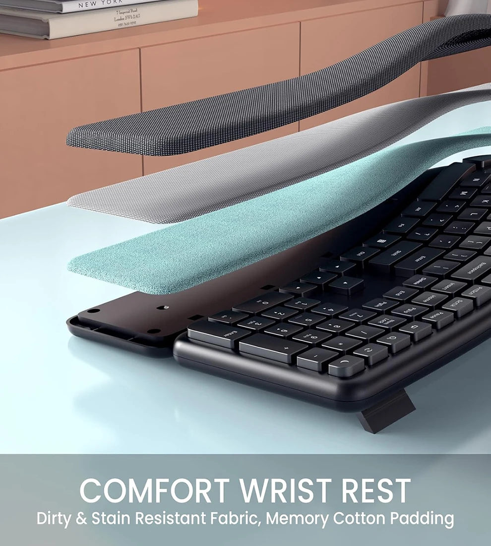 Black ergonomic keyboard with teal cushioned wrist rest and compact contoured body