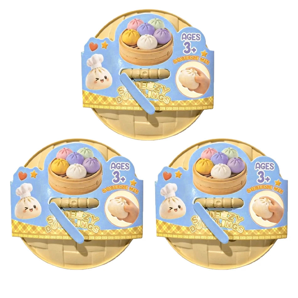 Three boxed squishy dumpling stress ball sets with bun steamer design, ages 3+
