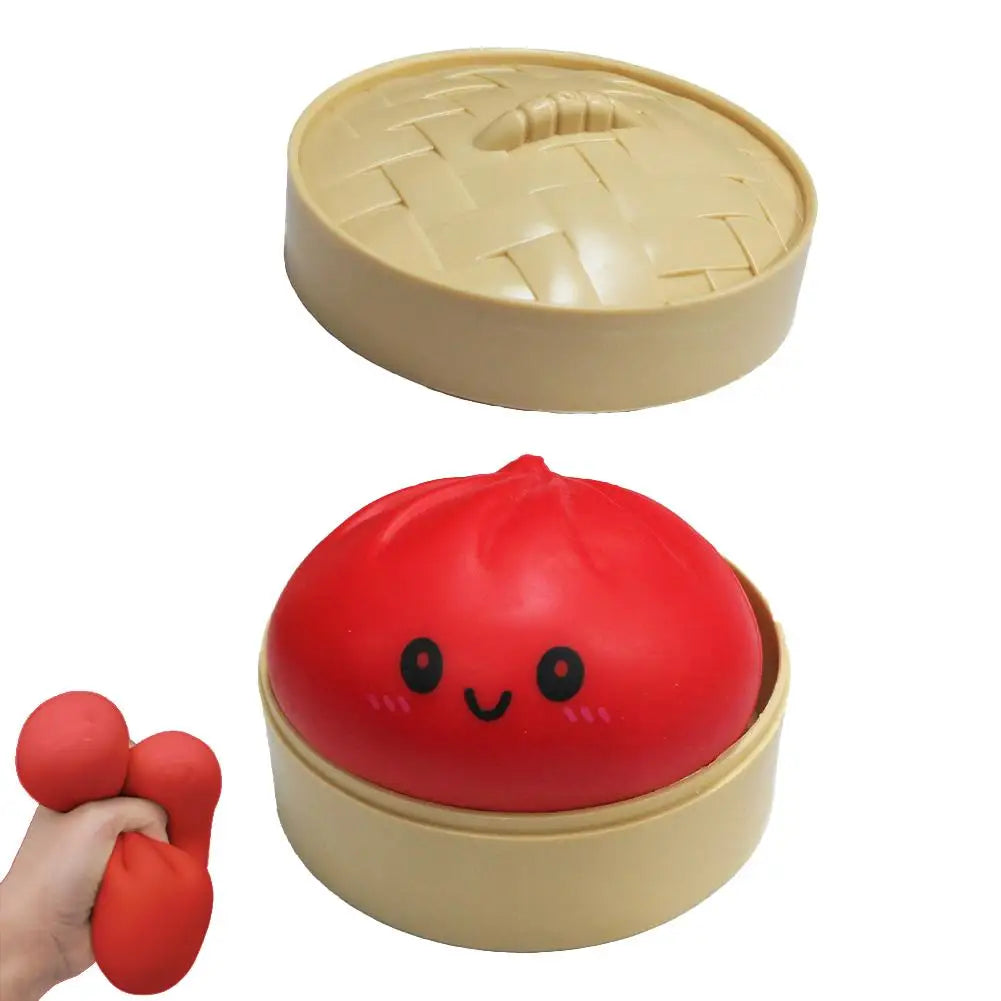 Red squishy dumpling bun stress toy with smiling face, pinchable lid