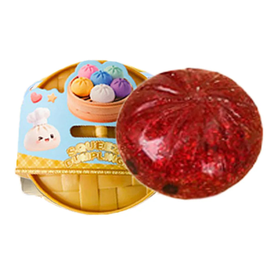 Red glitter squishy dumpling character next to packaged set