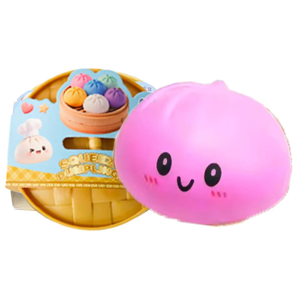Bright pink squishy dumpling character with cute face next to packaged set
