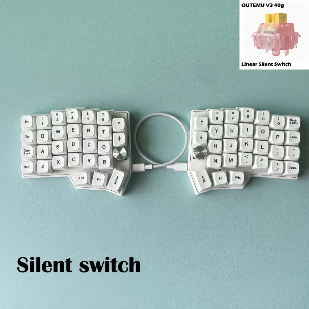 Split ergonomic keyboard with white keycaps and two knob modules for silent switches