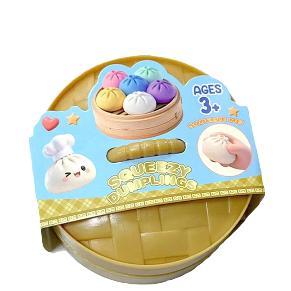 Dumpling squishy fidget toy packaged in yellow tray with colorful dumpling contents