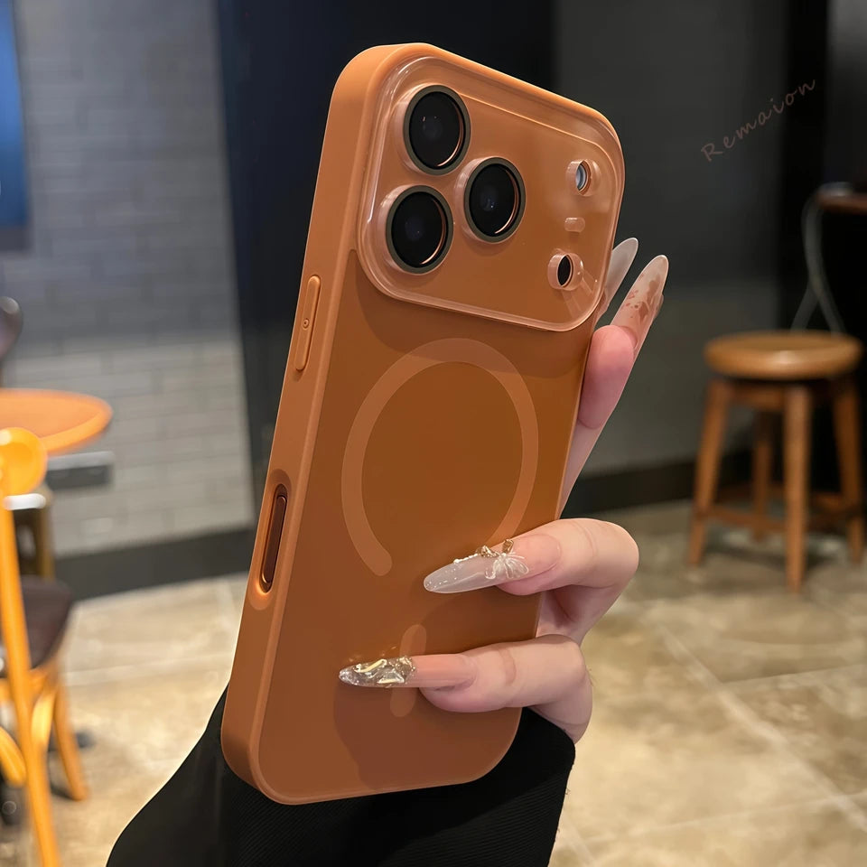 Magnetic phone case in warm orange-brown with large circular window cutout and camera lenses