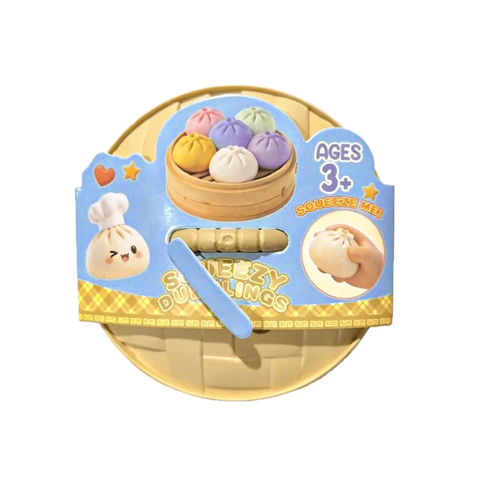 Packaged squishy dumpling stress ball set with bun steamer design, ages 3+
