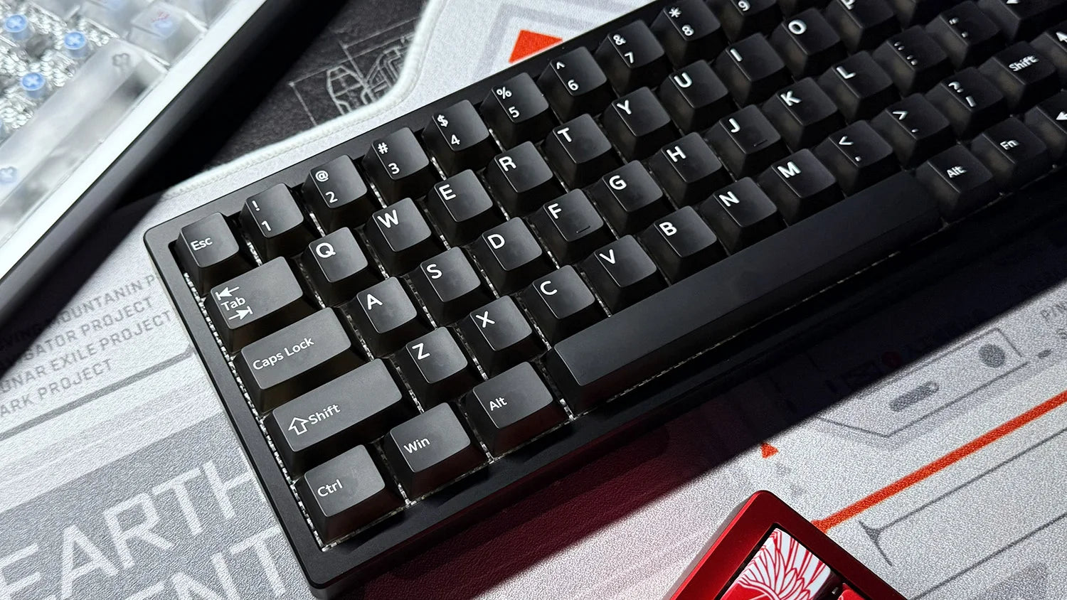 Mechanical keyboard with black keycaps and white legends
