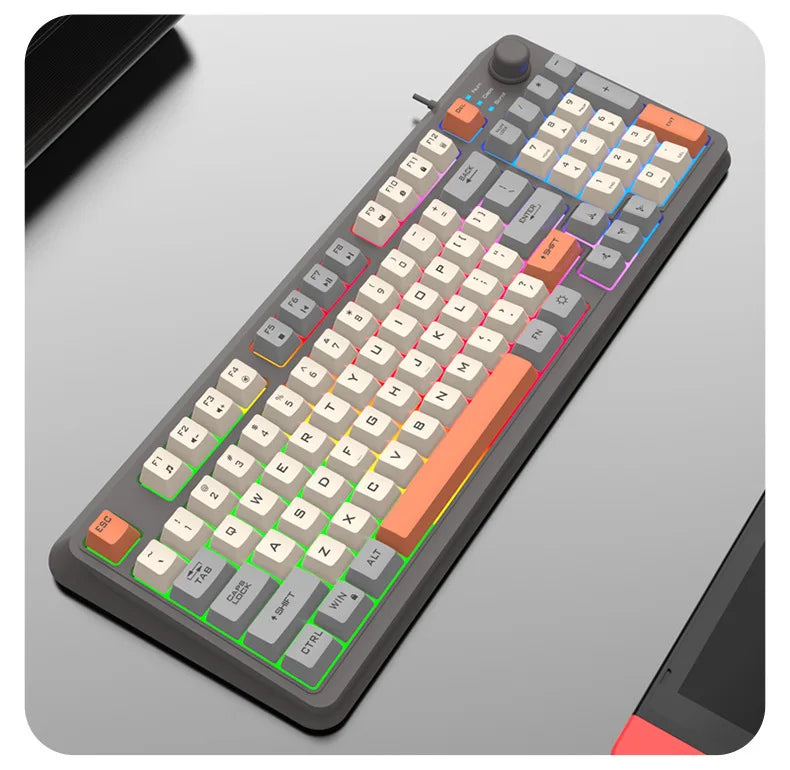 Wired RGB keyboard with volume knob, dark base and colorful backlit key rows
