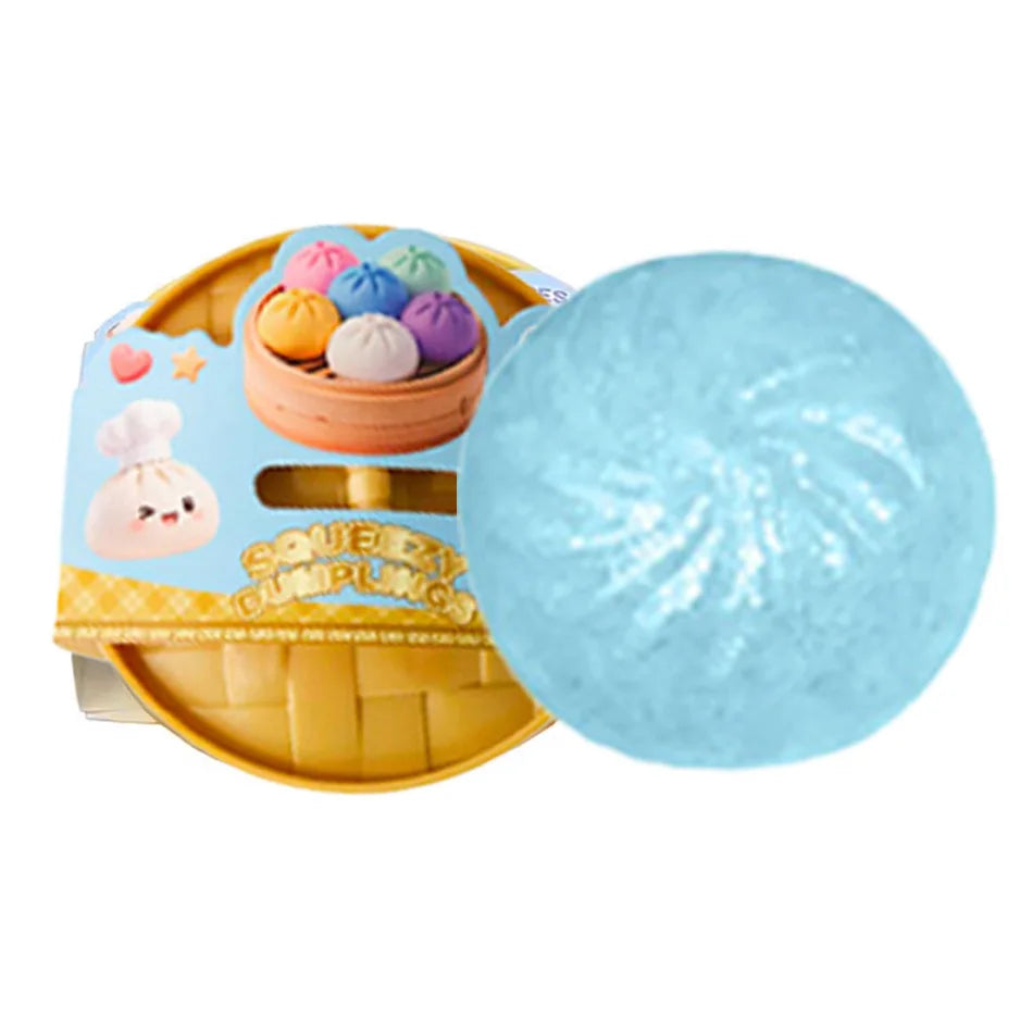 Light blue glitter squishy dumpling character next to packaged set