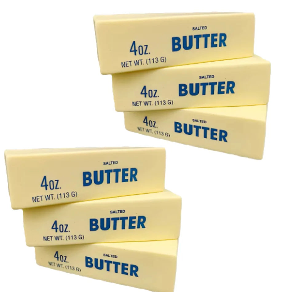Set of four yellow squishy butter stick toys labeled SALTED BUTTER 4oz