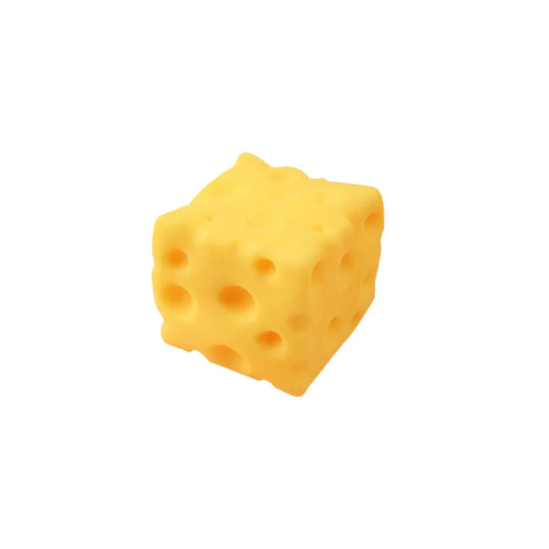 Yellow cheese-shaped squishy toy wedge with round holes