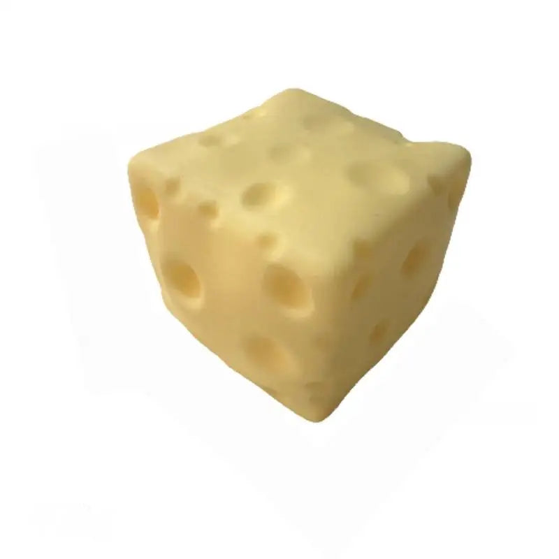 Triangle yellow cheese squishy toy with round holes, soft slow-rebound texture.