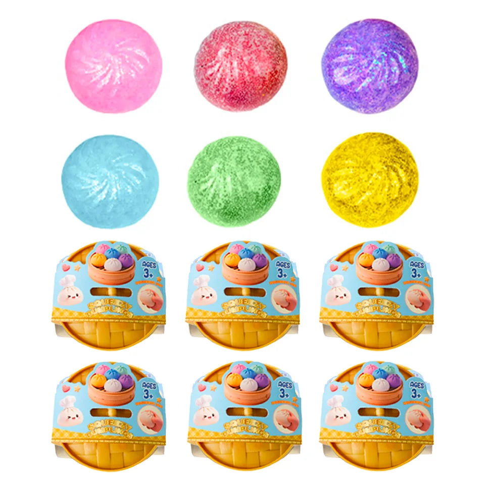 Assorted glitter squishy dumpling faces with boxed packages shown below