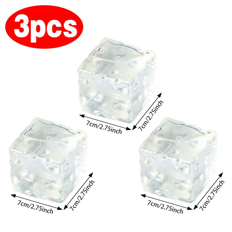 Set of three translucent jelly-like squishy cube toys with bubble texture