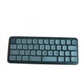 40% hot-swappable mechanical keyboard, dark teal base with gray/teal keycaps.