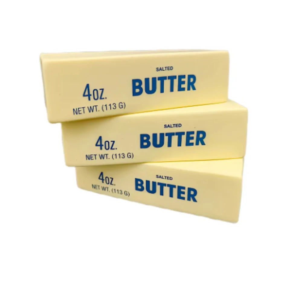 Three squishy butter stick toys labeled SALTED BUTTER 4oz each