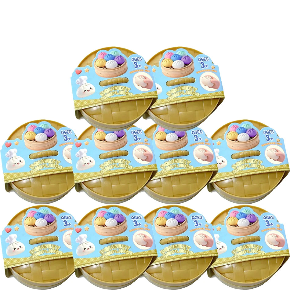 Multiple dumpling squishy mystery stress-relief fidget toys in blue-and-gold packages
