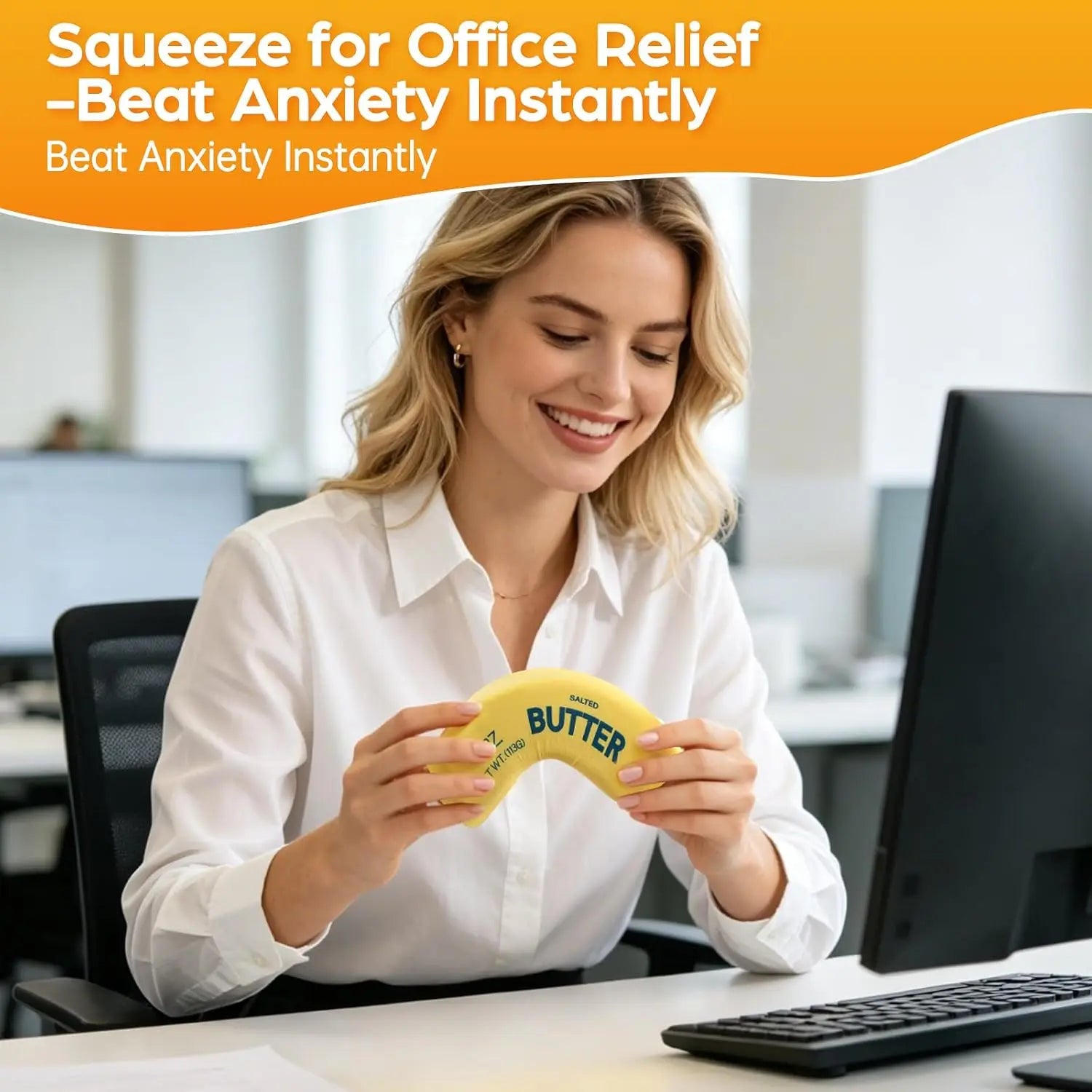 Yellow butter-shaped squishy fidget toy held at desk, 4oz labeled