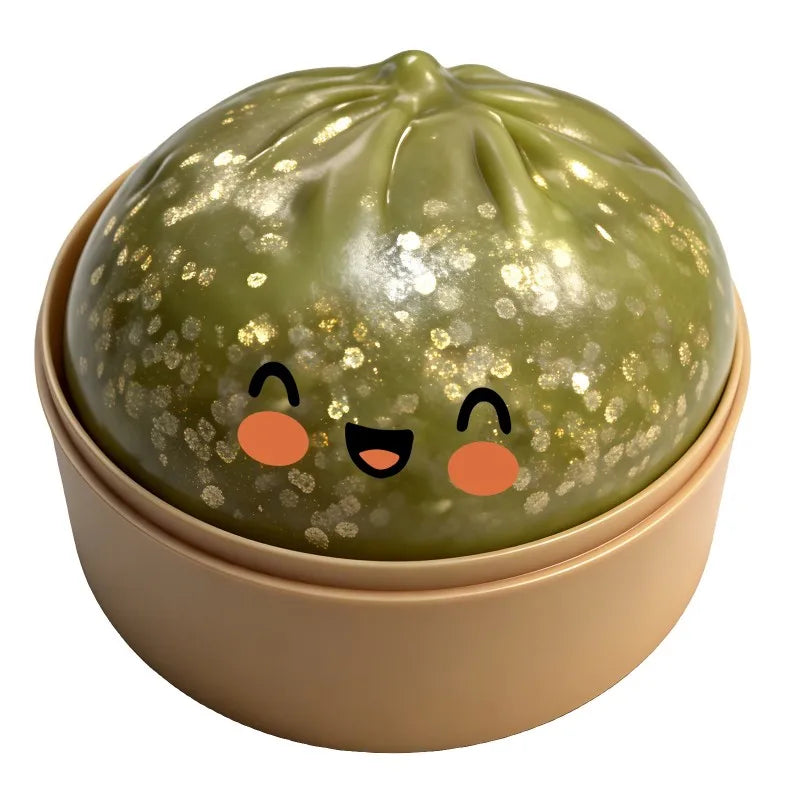 Olive green glitter dumpling squishy fidget ball ornament with smiling face, gold base