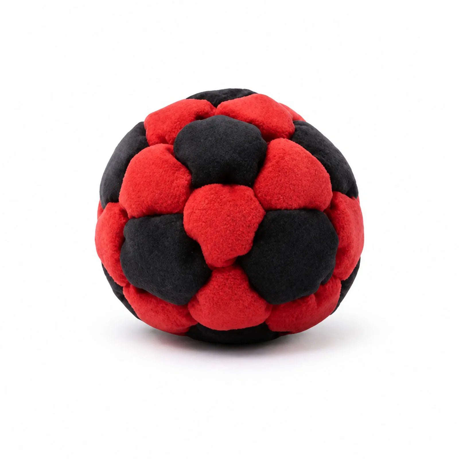 Red and black plush footbag ball with padded patch design, soft fuzzy fabric.