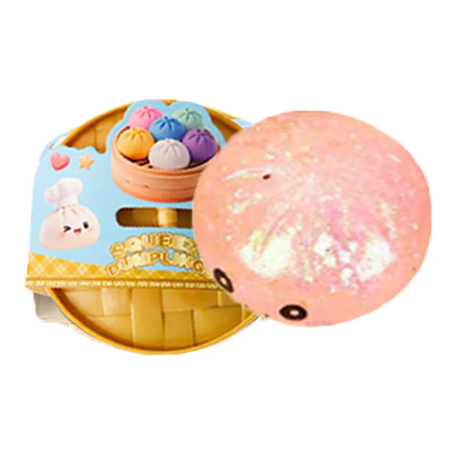 Pink squishy dumpling with glitter texture next to packaged set