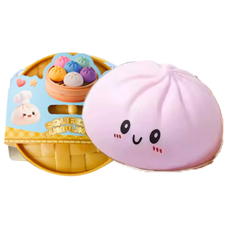 Light pink squishy dumpling character with cute face next to packaged set