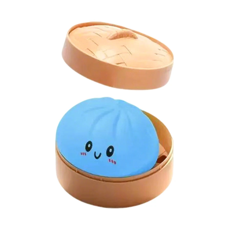 Orange-brown squishy bun stress ball with blue face in open steamer top
