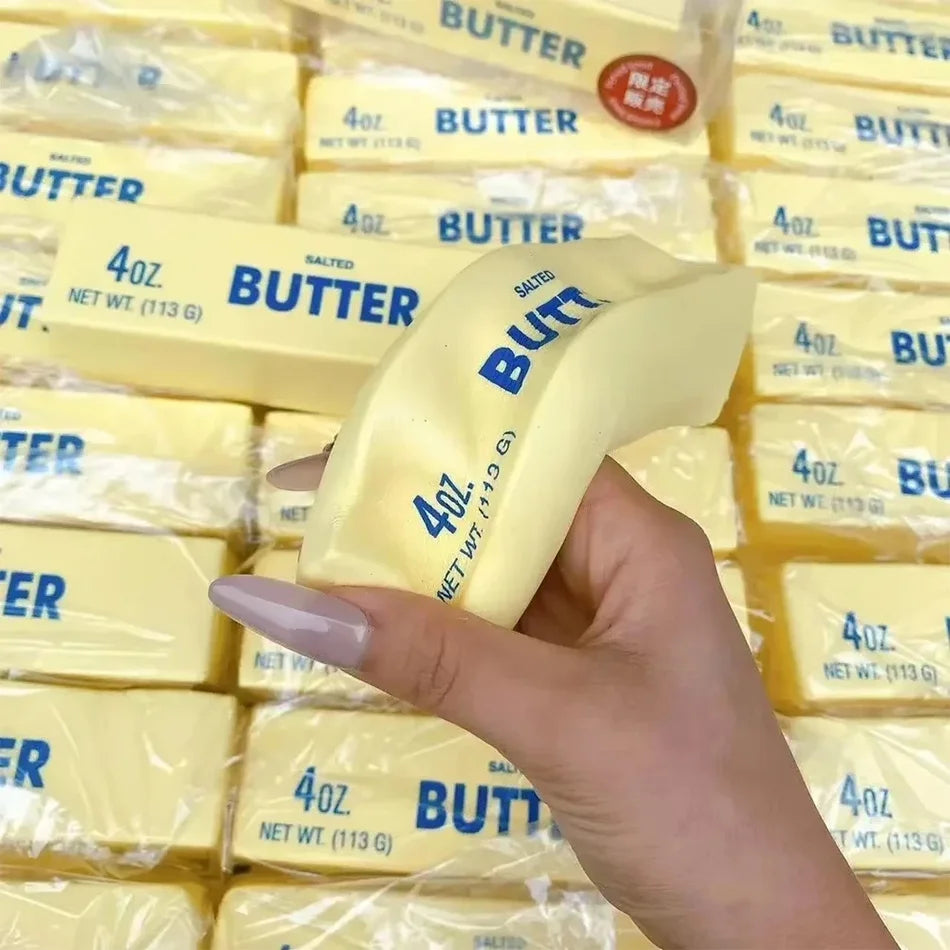 Yellow butter-stick squishy toy close view, 4oz 113g salted BUTTER text