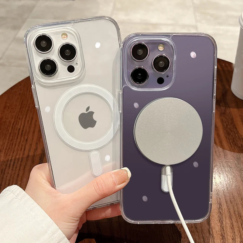 Clear MagSafe phone case with charging ring and camera cutouts; dark purple case behind