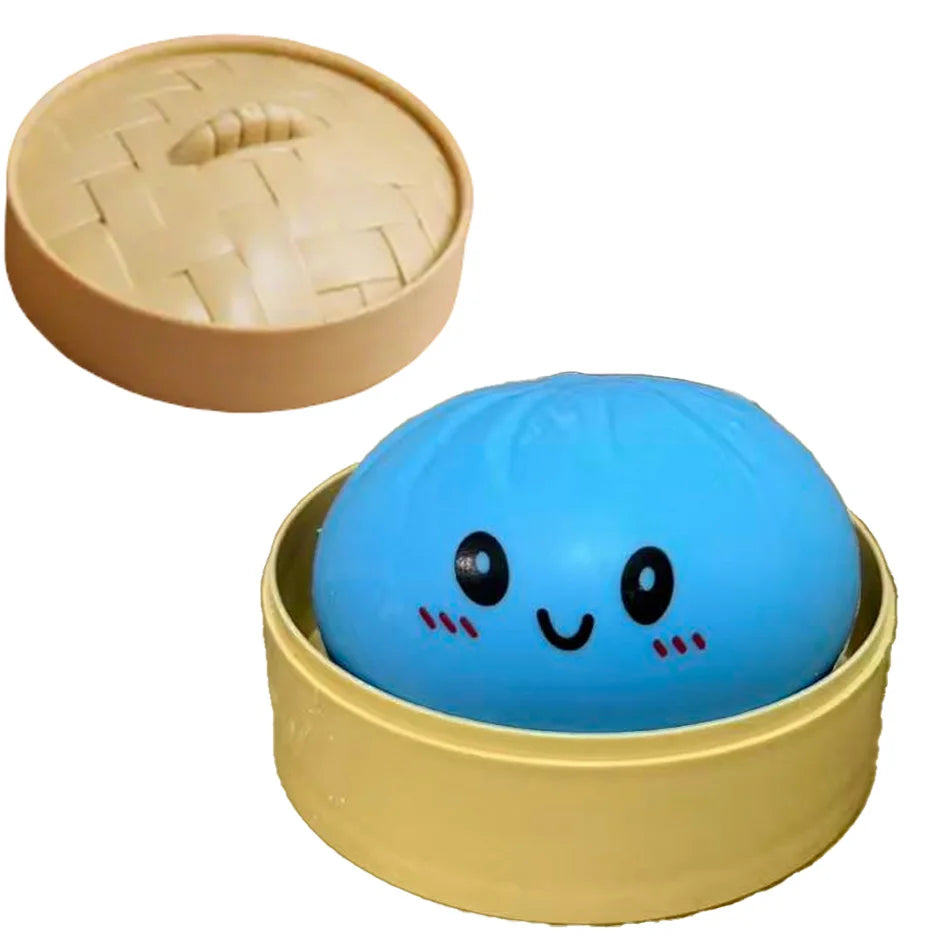 Blue dumpling squishy in gold rim container with cute smiling face