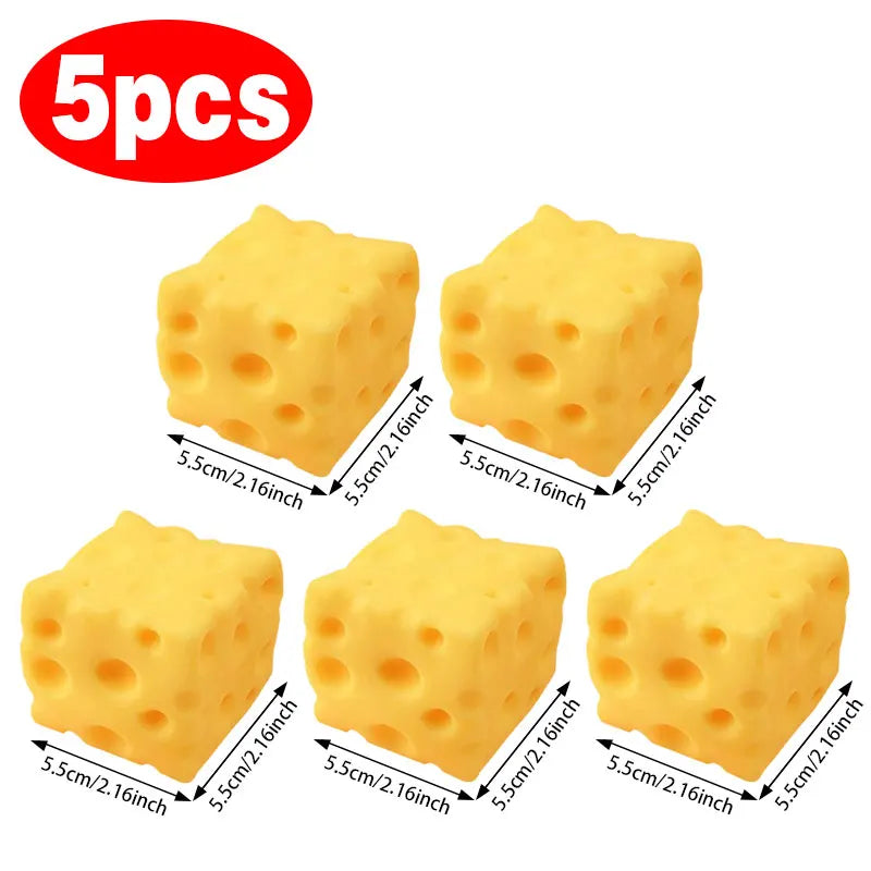 Set of five yellow cheese-shaped squishy toys with round holes